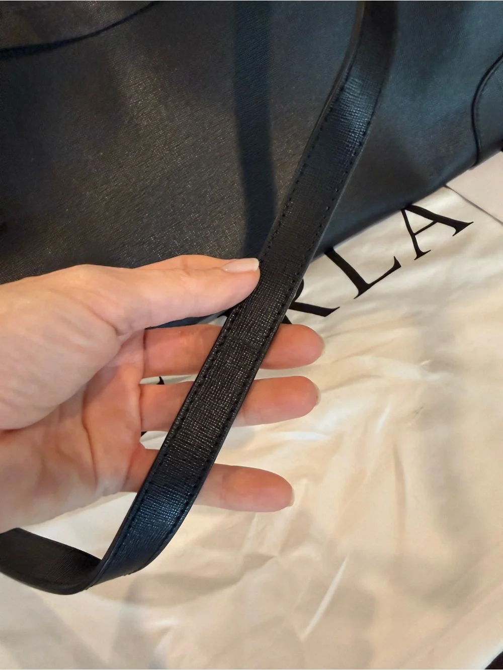 Furla downsizing figured